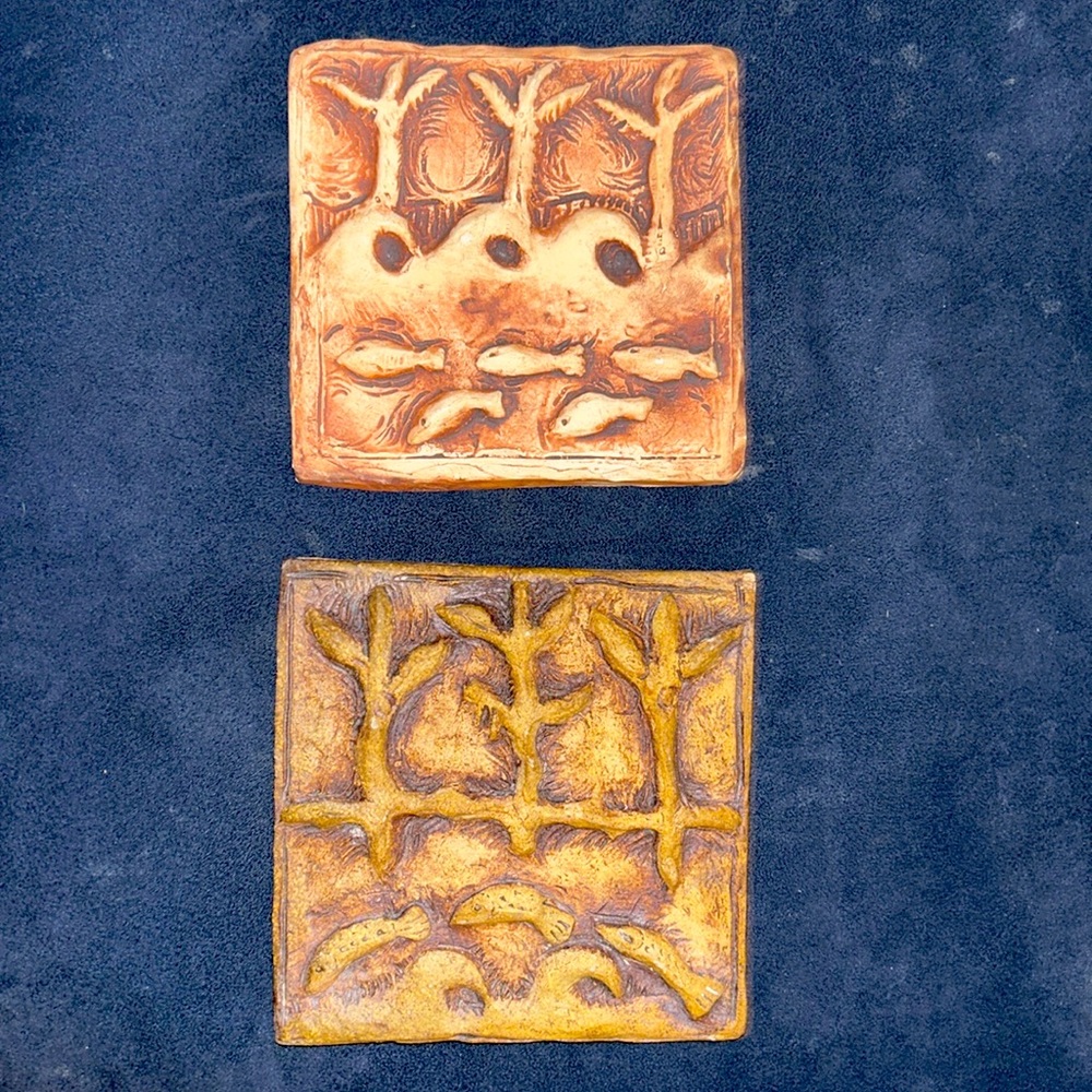 SET OF TWO square ceramic wall hangings. Approximately 5” x 5” handmade.